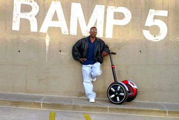 A man with his Segway HT.